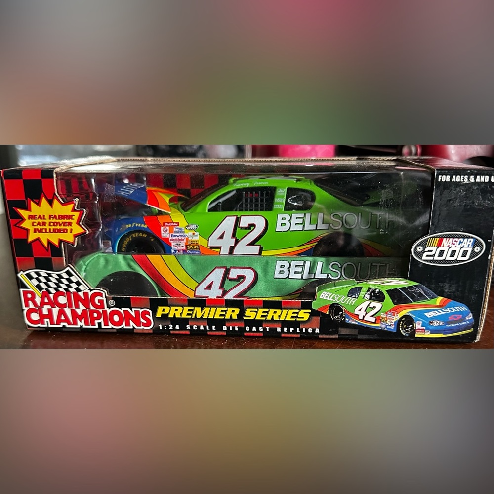 Premier series diecast car with opening hood and car cover NASCAR